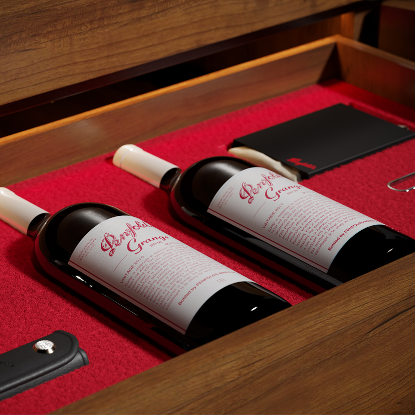 Open drawer reveals two Grange magnums with white capsules