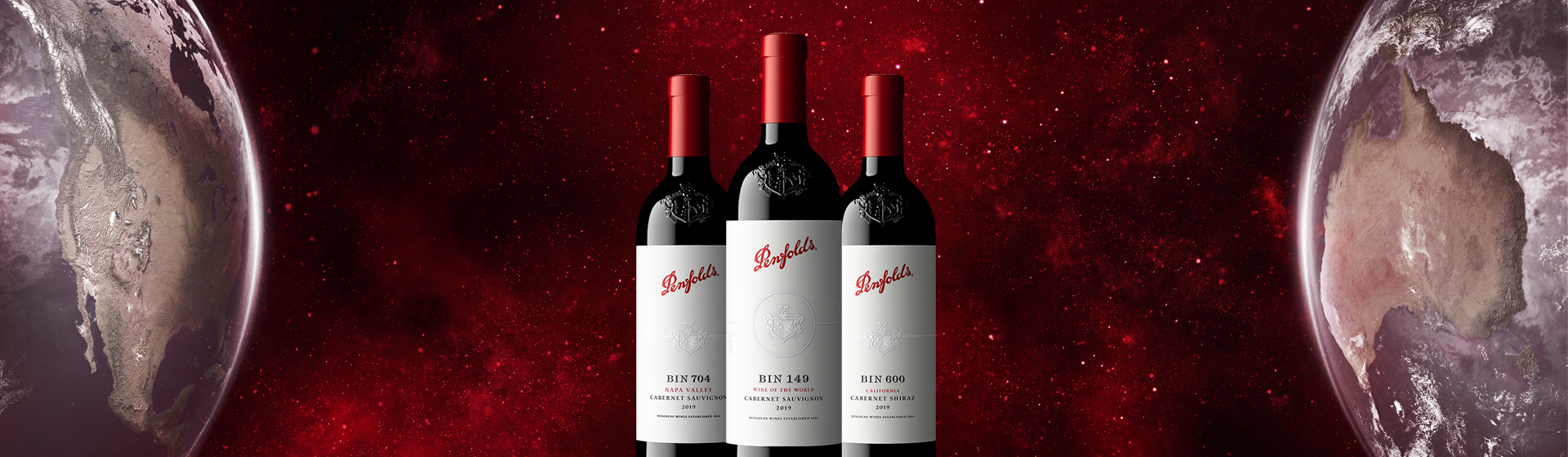 Three Penfolds bottles sit between two globes against a red galaxy background