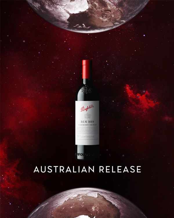 Penfolds Bin 389 bottle between two globes against a red galaxy background