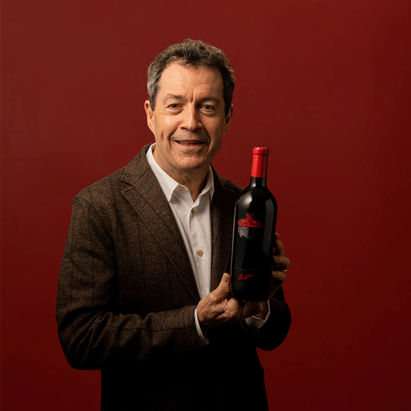 Penfolds Chief Winemaker Peter Gago holds bottle of Penfolds Superblend