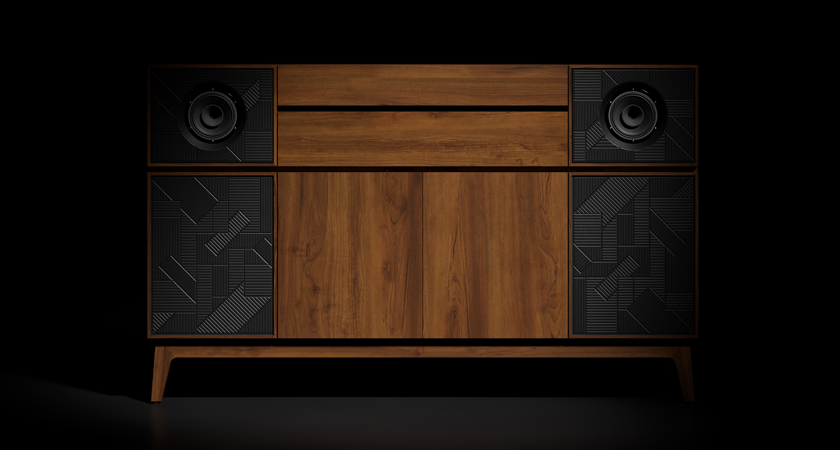 Closed record console against black background.  Wood paneling and black speakers are visible.