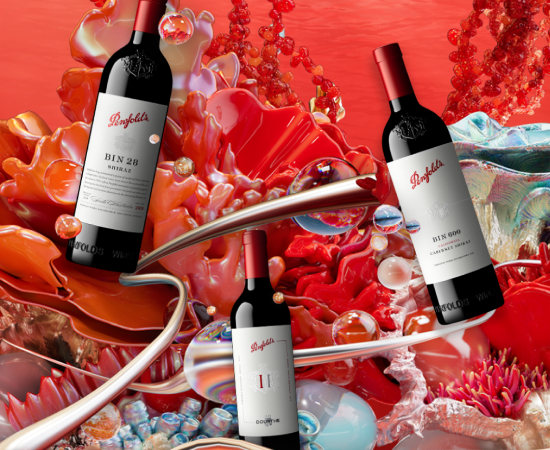Six bottles of Penfolds wines stand against a red background.