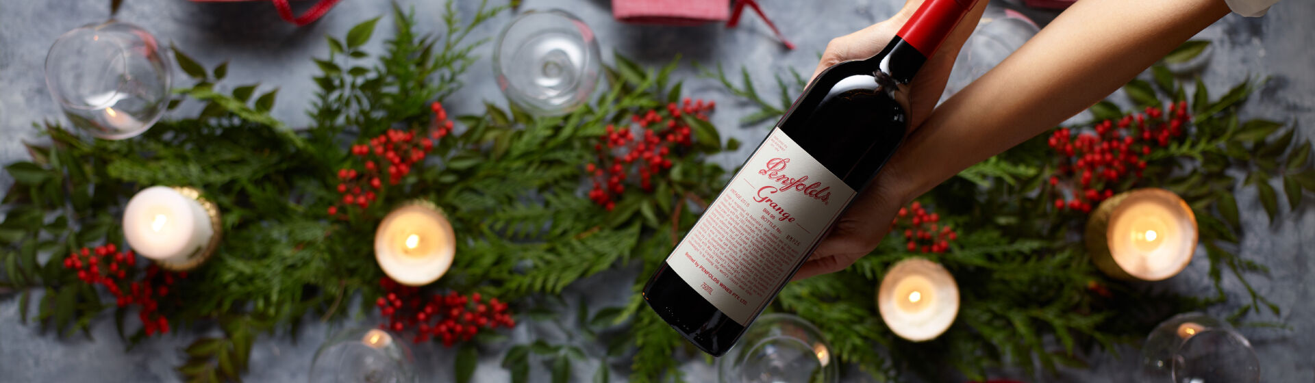 Penfolds Grange being gifted over festive table scape