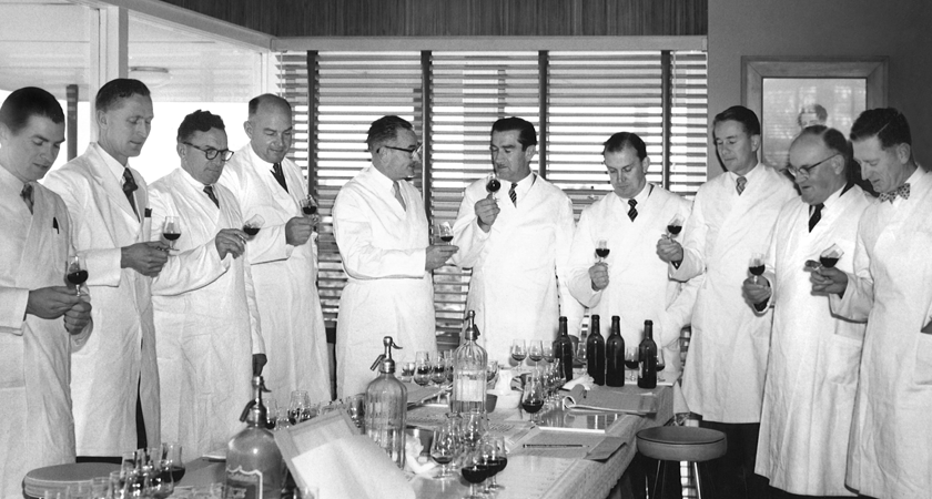 The Penfolds winemaking team during a tasting in the late 1950s