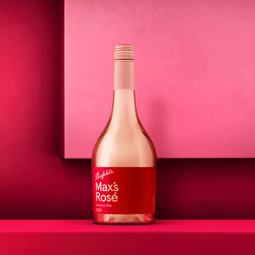 Penfolds Max's Rose bottle with red label against two tone pink background