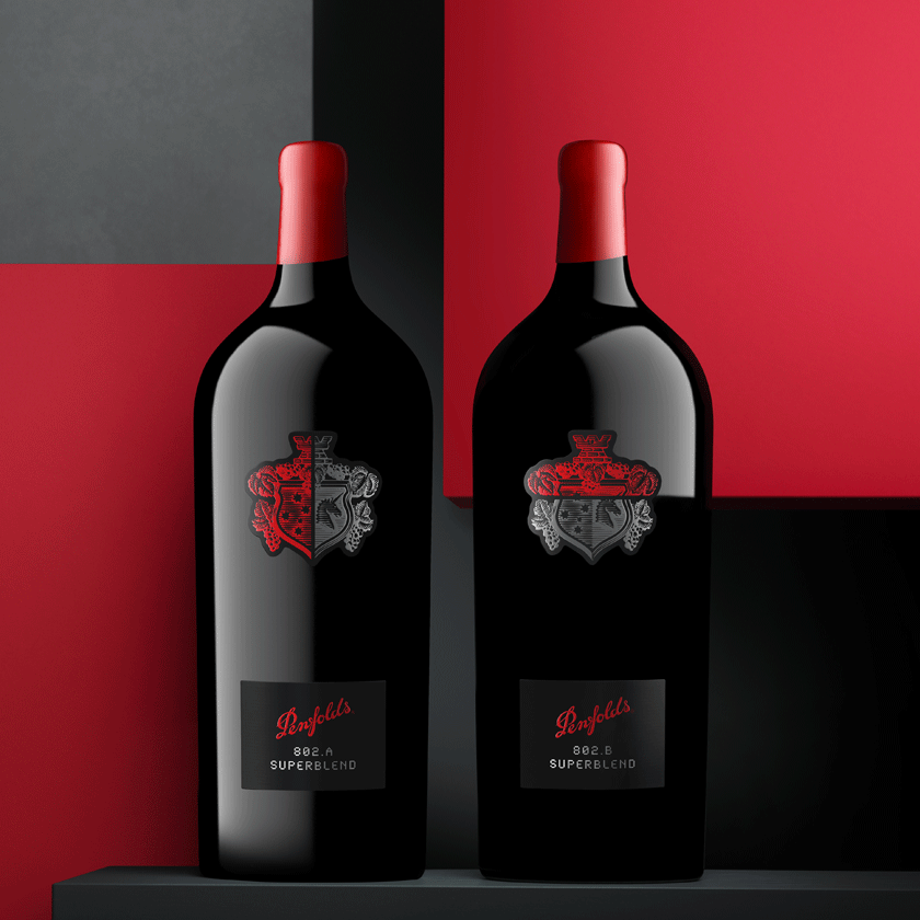 Two Imperial 6 litre Penfolds Superblend bottles against red and charcoal background