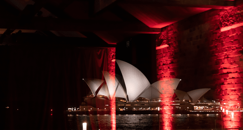 View of Sydney Opera house lit red