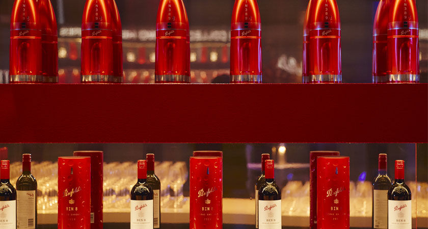 Penfolds space-themed gift tins appear across two shelves