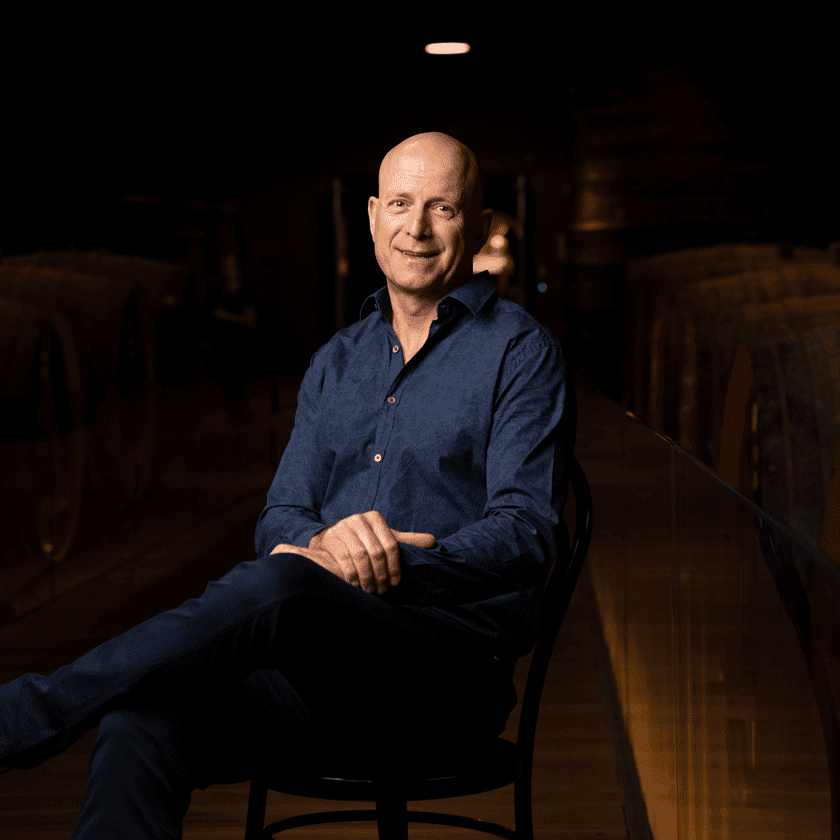 Andrew Hales, Penfolds Winemaker, sits in the warmly lit tunnels of the winery