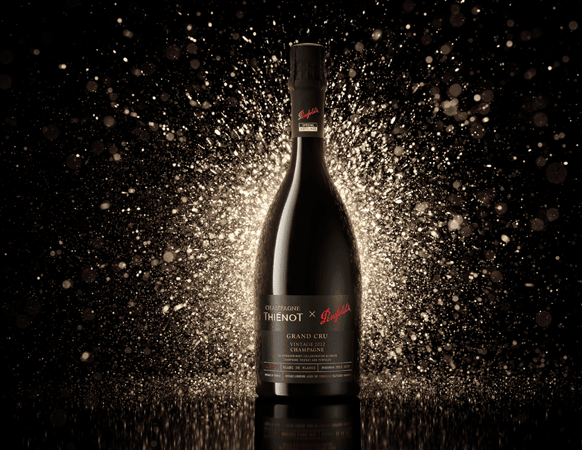 Penfolds x Thienot Champagne with gold sparkle background