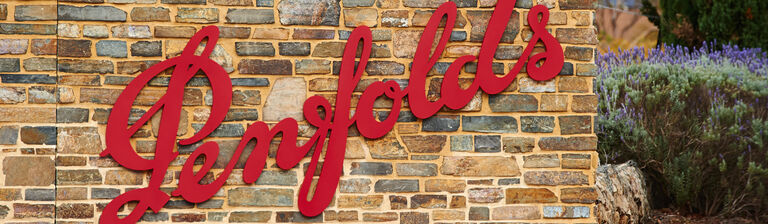 Rock wall with Penfolds sign at Magill Estate