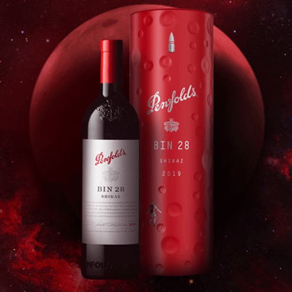 Penfolds Bin 28 Shiraz Bottle and Moon Crater shaped red tin gift box 