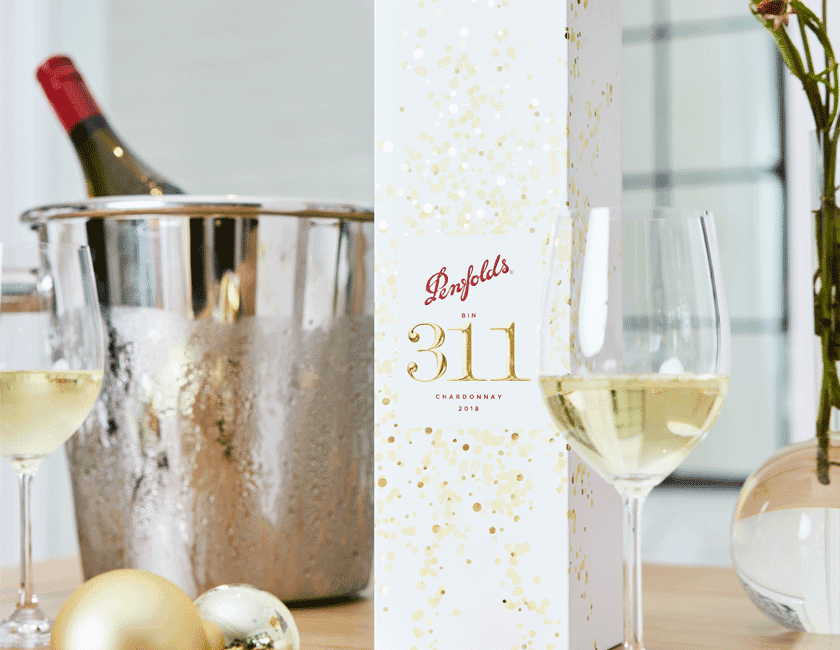 Overhead shot of Bin 311 white gift box with Bin 311 chardonnay wine bottle